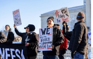 Members of the New England Fisherman’s Stewardship Association protest a government agency rule that requires fishing ships like the Relentless to pay to transport and house federal inspectors.