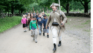 Park Ranger Jim Hollister leads a school group at Minute Man National Historical Park in Massachusetts.