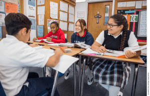 Students at St. Elizabeth of Hungary, a PK-8 private Catholic school in Dallas, work on a lesson.