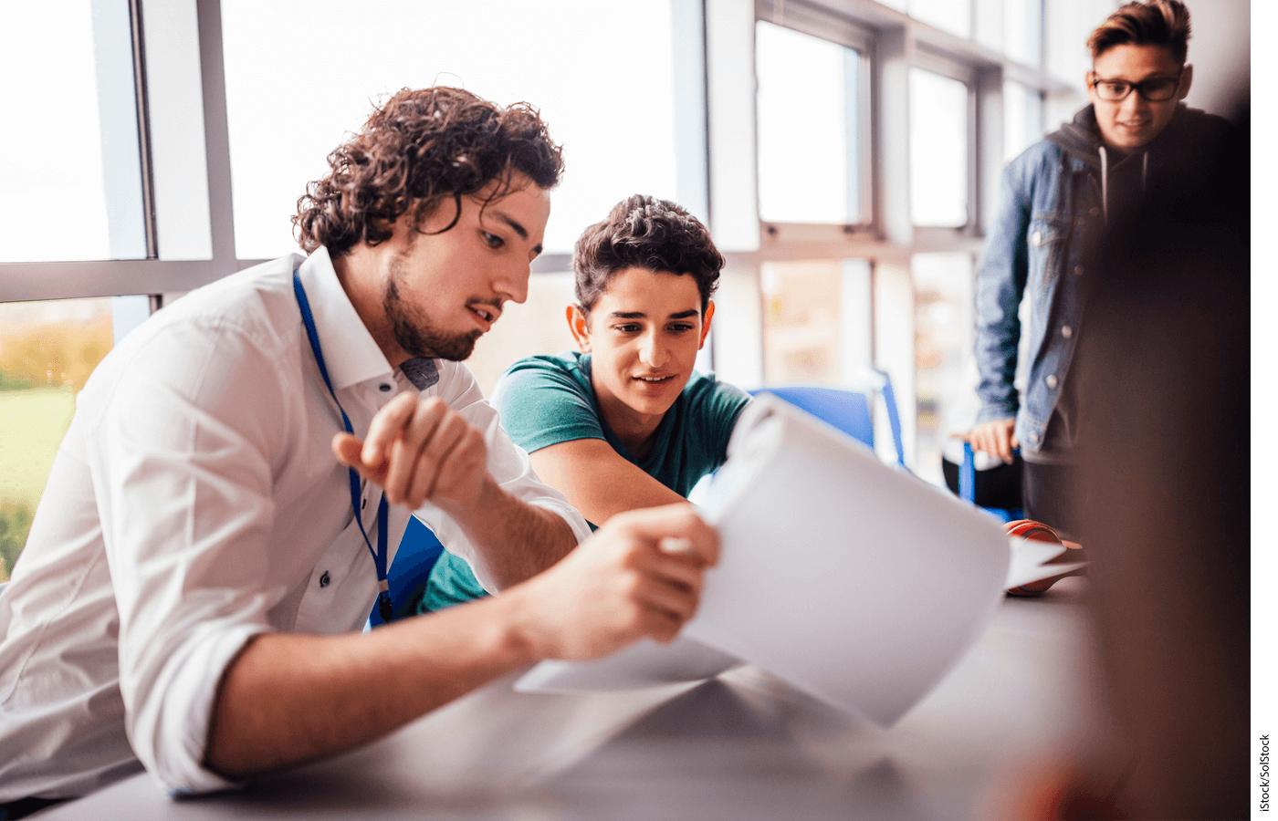 A tutor works one-on-one with a student